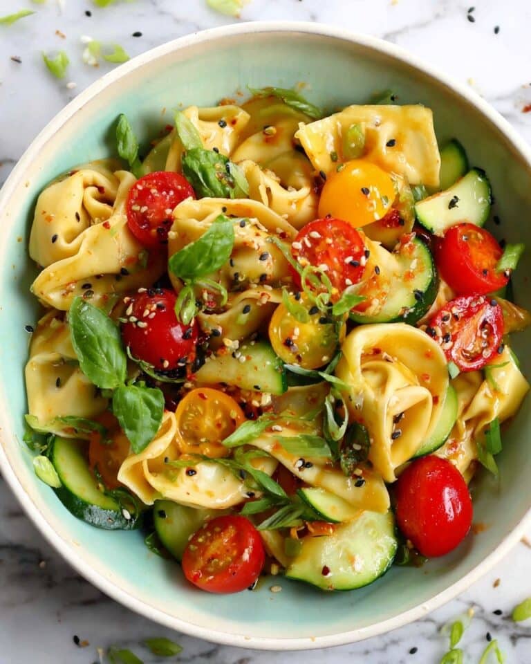 Potsticker Salad with Heirloom Tomatoes, Cucumber, Basil, and Sesame Dressing Recipe