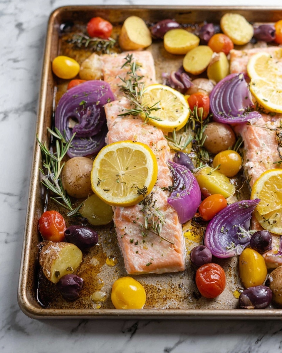 A tray of baked salmon and vegetables is shown with two salmon fillets at the center, light pink with a soft texture. Around the salmon, there are slices of yellow lemon placed on top and beside it. Red onion rings with a translucent purple color are scattered, some resting on the salmon. Small red and yellow cherry tomatoes and whole dark brown olives are spread around, adding bright spots of color. Pieces of yellow, purple, and red potatoes with rough skin and smooth inside are mixed in, some cut in halves or quarters. Sprigs of fresh green rosemary are placed on the tray, adding a touch of green texture. The food sits on a metal baking tray that has some cooked oil and herbs around. The background is a white marbled surface. photo taken with an iphone --ar 4:5 --v 7